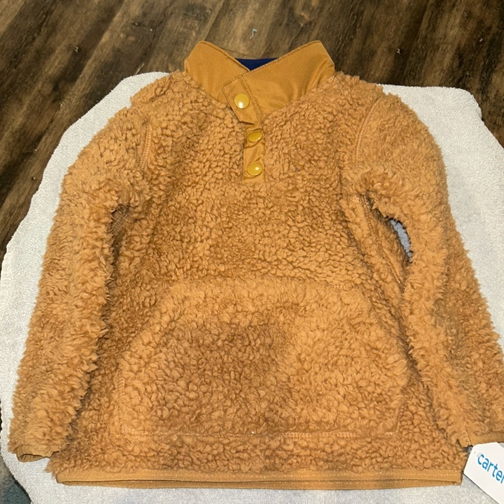 Carter Sherpa size 3T.